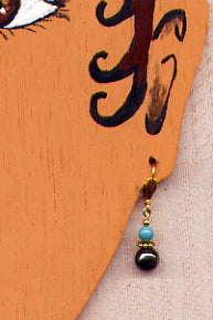 boucles d'oreilles charmeuse