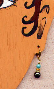 boucles d'oreilles charmeuse